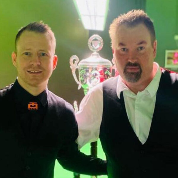 Thorri Jensson and Jóhannes B Jóhannesson pose in front of the Icelandic Snooker Championship trophy.