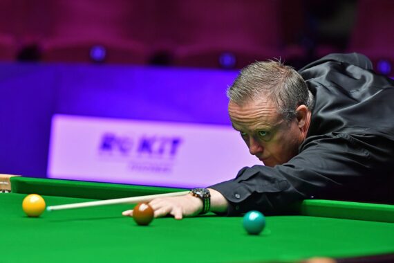 Aaron Canavan playing a shot at the Crucible Theatre during the 2020 World Seniors Snooker Championship.