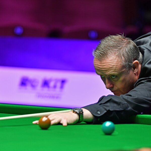 Aaron Canavan playing a shot at the Crucible Theatre during the 2020 World Seniors Snooker Championship.