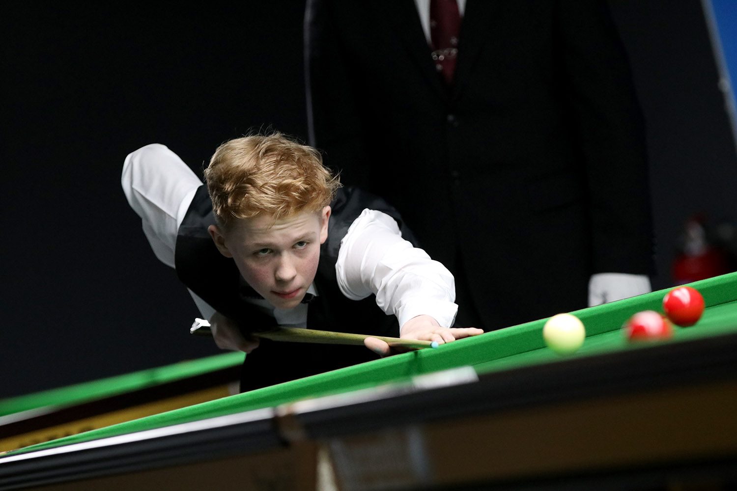 Artemijs Žižins plays a shot.