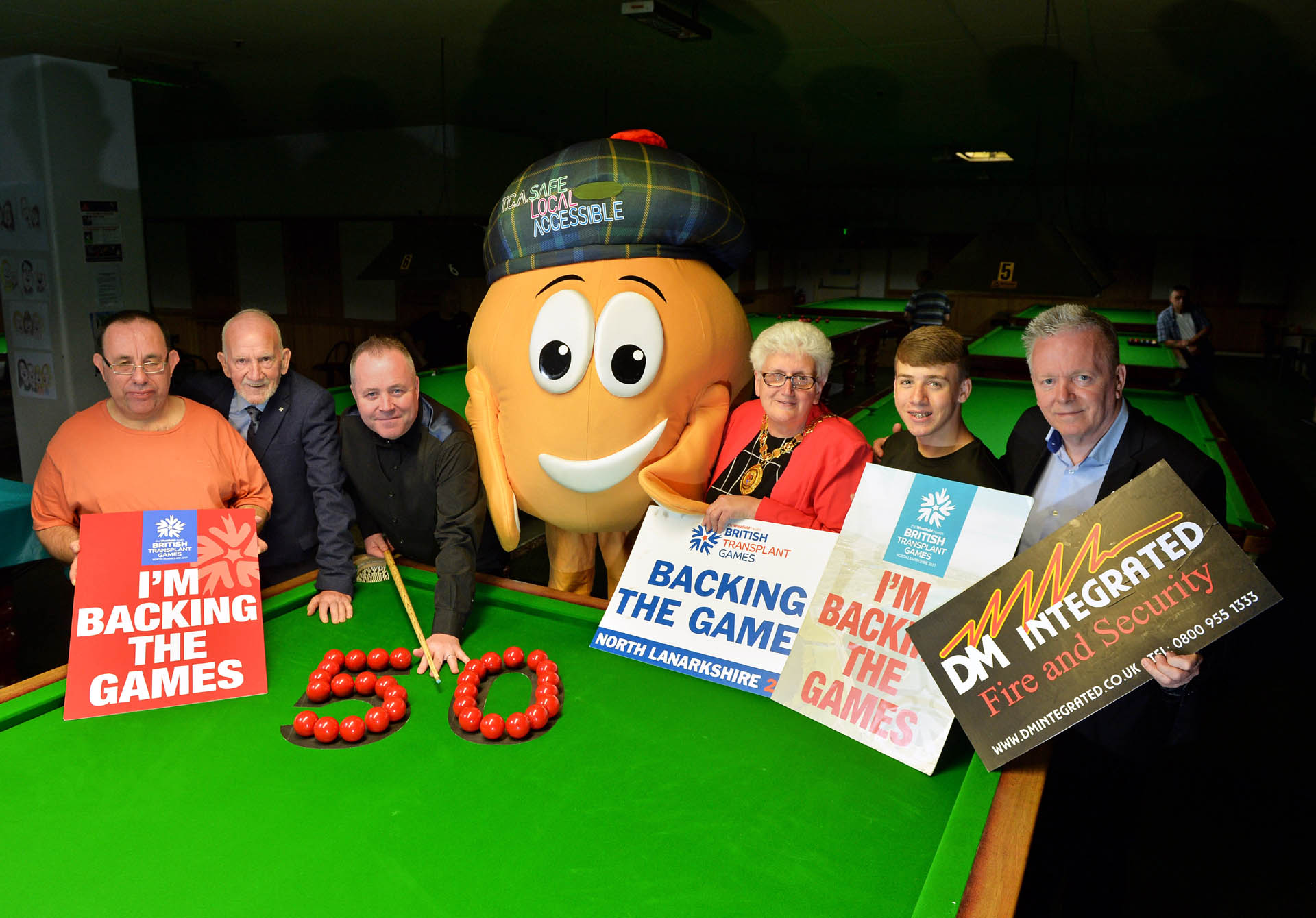 Photo of John Higgins and group