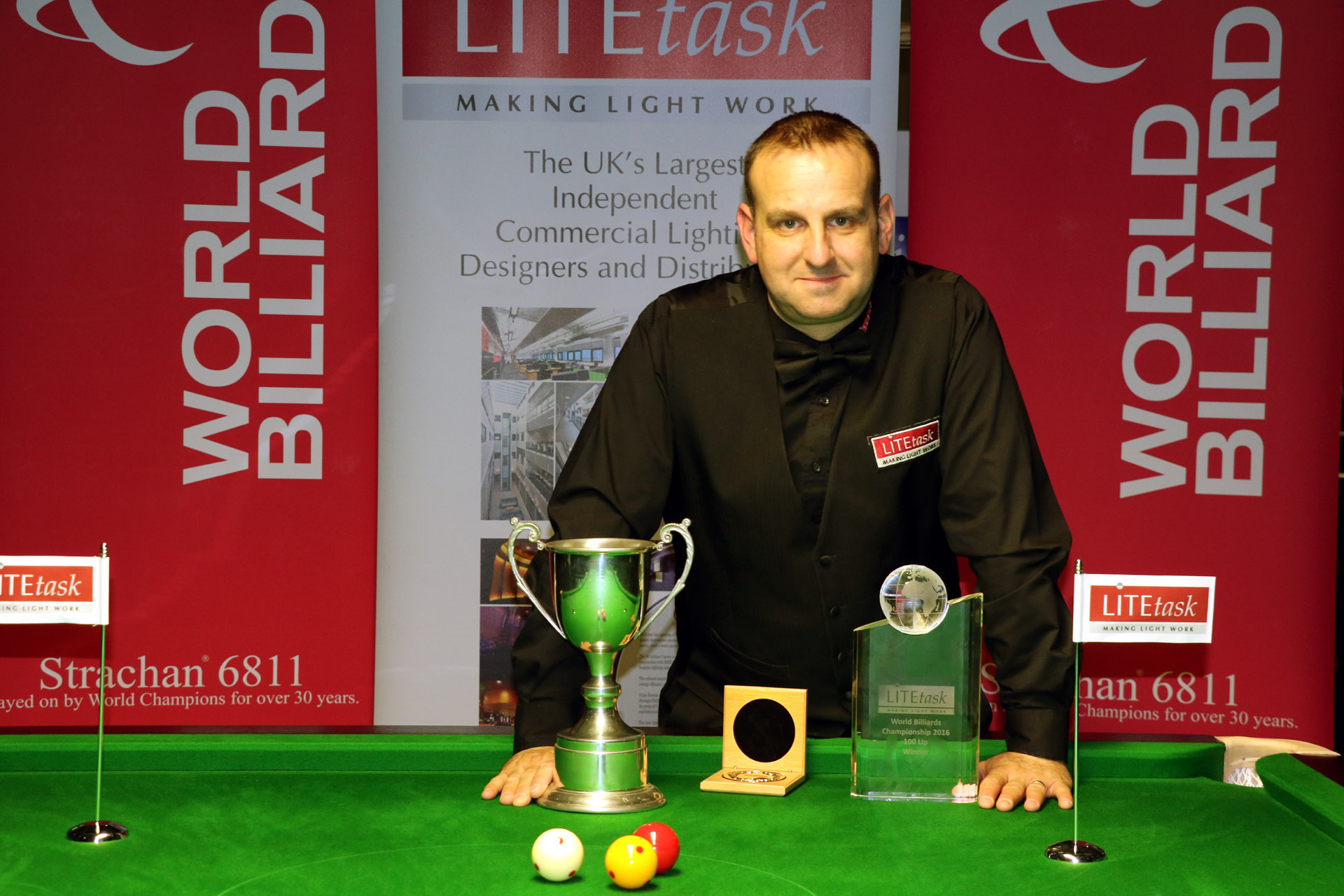 Photograph of Dave Causier with trophy