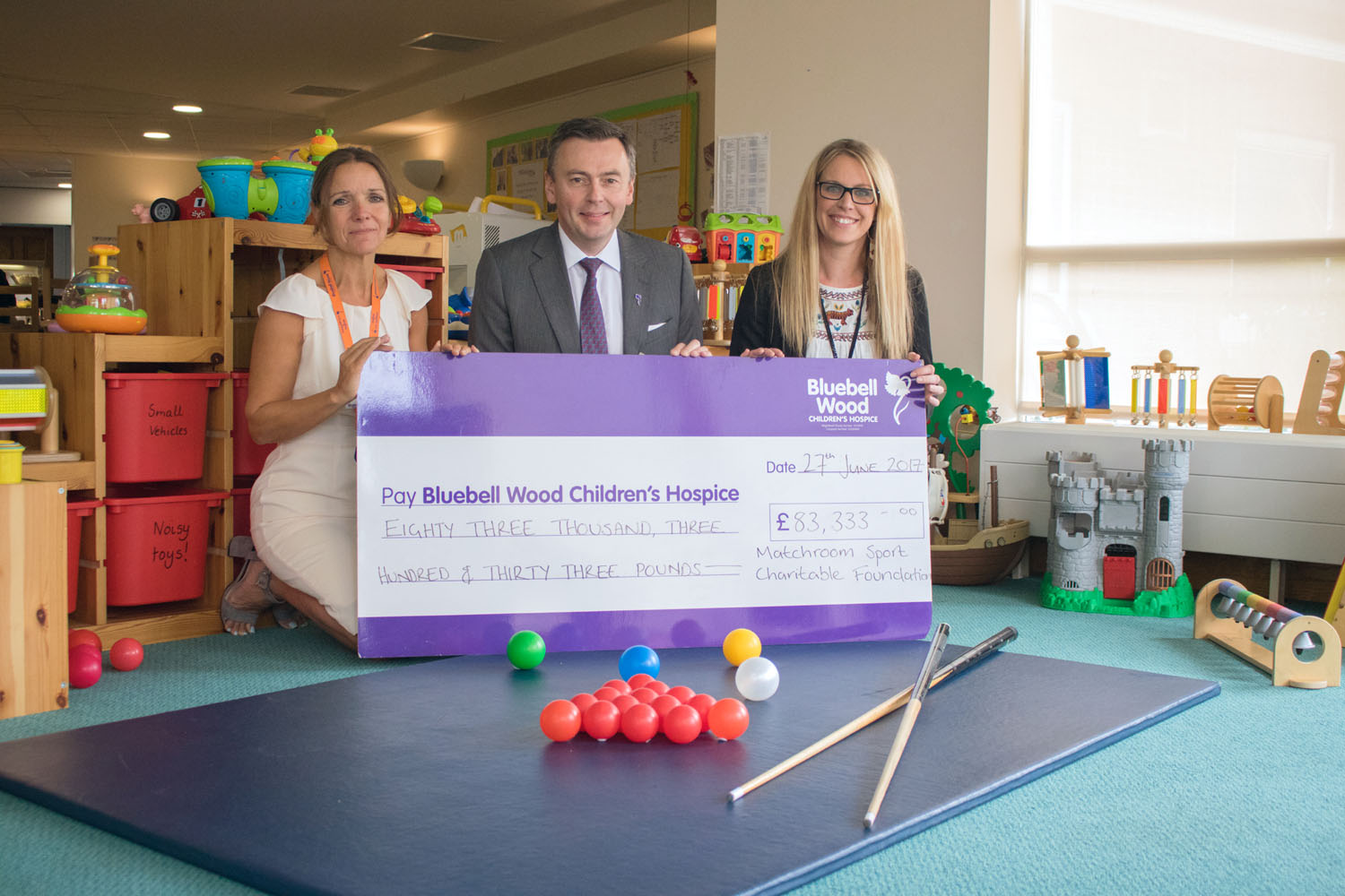 Jason Ferguson presenting cheque