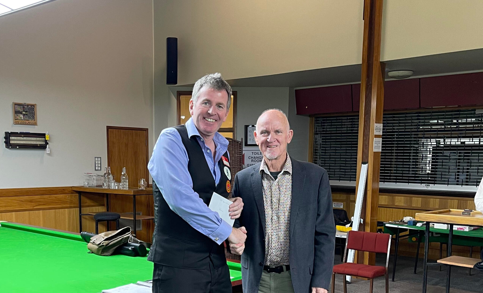 Peter Gilchrist poses for photo as he is awarded with the winner's prize.