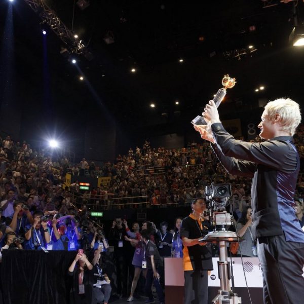 Neil Robertson holds trophy