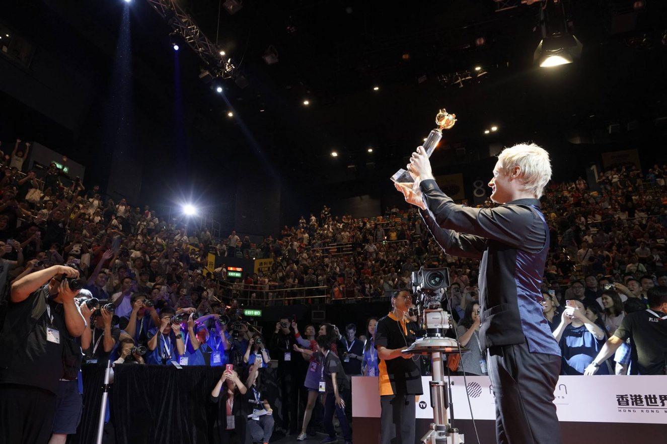 Neil Robertson holds trophy