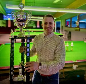 Thorri Jensson poses with the Icelandic Snooker Championship trophy.